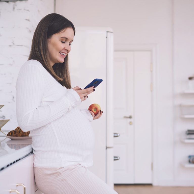 Healthcare, pregnancy and hands of doctor with pregnant woman for support, comfort and compassion. Medical care, family home and top view of health worker holding hands with maternal patient.